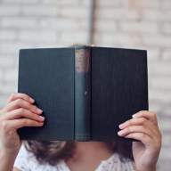Reader curled up with a book