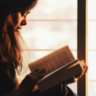 Reader curled up with a book